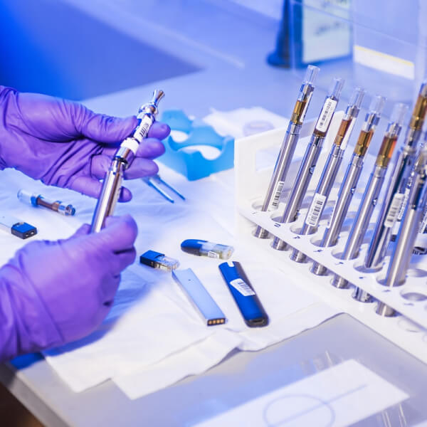 diagnostic-lab-hand-holding-tools.jpg